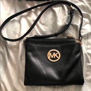I’m selling my used Michael Kors bag